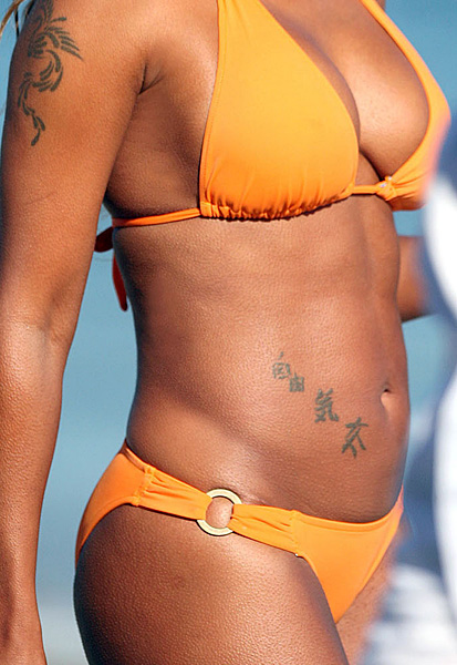 Mel B in Gold Bikini